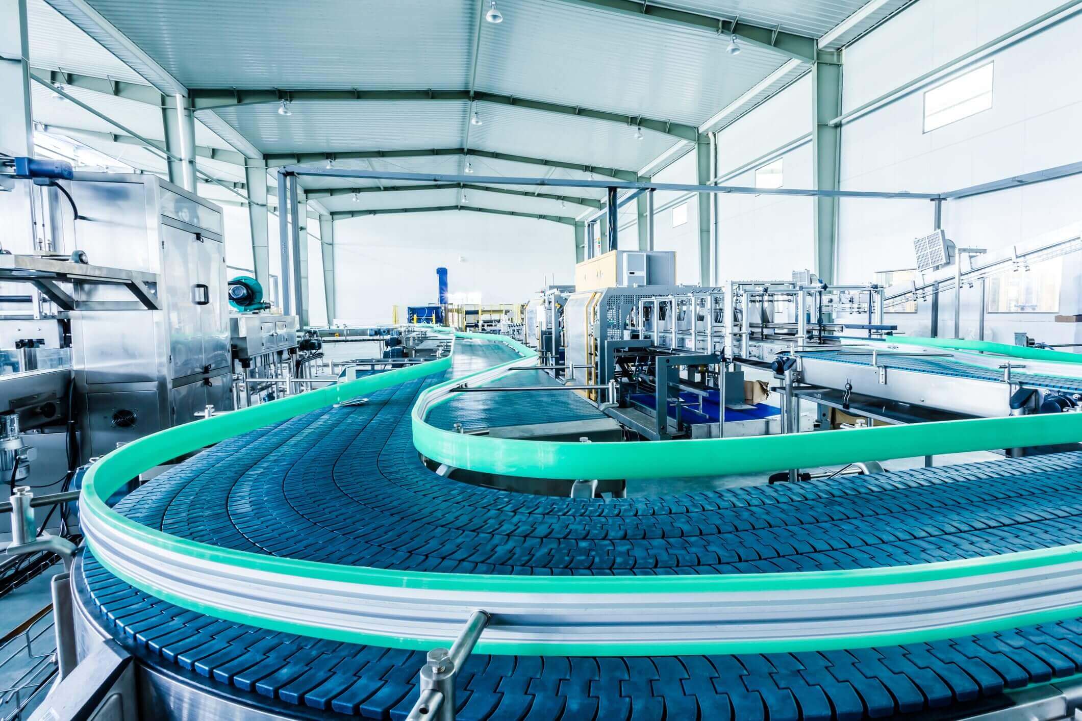 Modern beverage factory conveyor belt system.
